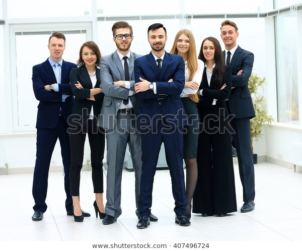 Smiling Confident Business Team Standing 600w 407496724