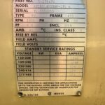 a sign on a metal surface